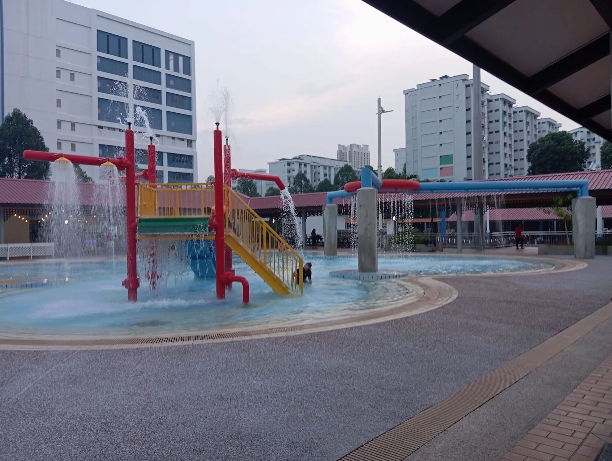 Water arches and fountains around the shallow wading pool